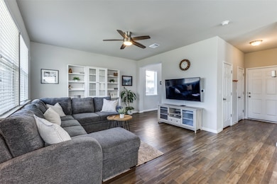 Living room featuring plenty of natural light, ce