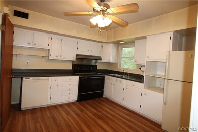 The kitchen is just off the Living Room and situat