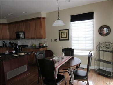 View of the dinette area and custom window treatme