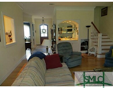 Living Room. The view looking towards the foyer an