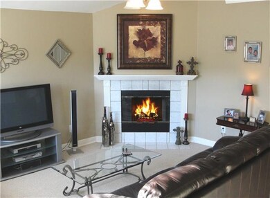 512 Creek Point boasts warm colors and a great gas fireplace