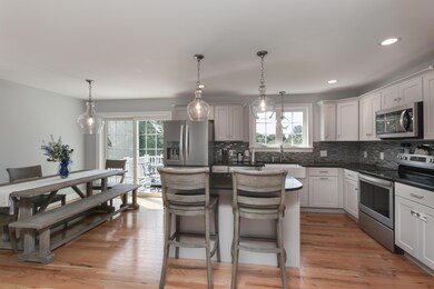 Kitchen with seating at breakfast bar