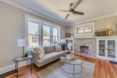 Built-ins flank beautiful Fireplace & Original Sta