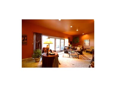 East-facing wall of windows in living room