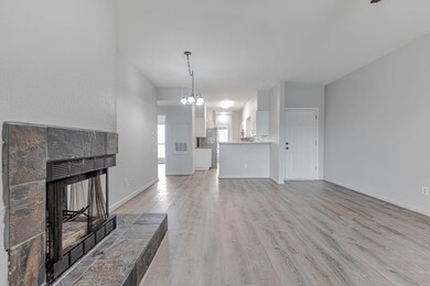 Unfurnished living room featuring light wood-type