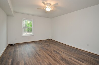 One of the large bedrooms.