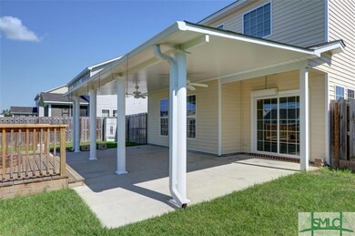 Extra large covered back porch.