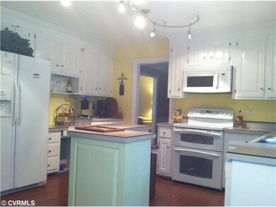 Kitchen - Sunny Eat-In Kitchen features loads of c