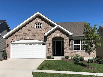 View of front facade with a front yard