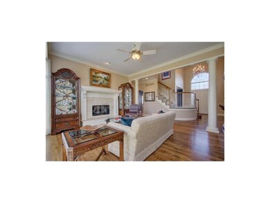 Cozy up to fireplace in this great room.