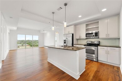 Kitchen featuring appliances with stainless steel 