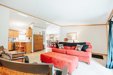 Spacious with wood laminate flooring.