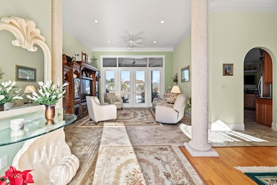 Living room with light hardwood / wood-style floor