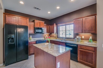 Cherry cabinetry & granite countertops