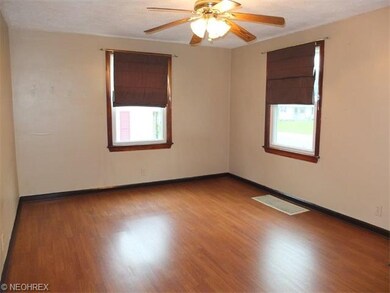 Living room with new laminate flooring.