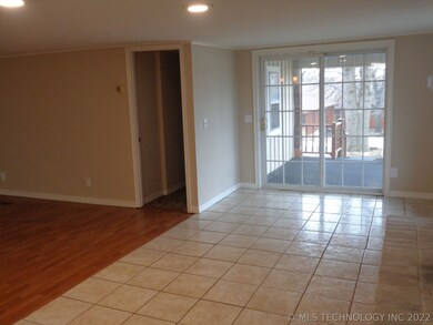 View looking toward entry from kitchen; Enjoy easy