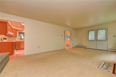 Living room is accessed through the kitchen, dinin