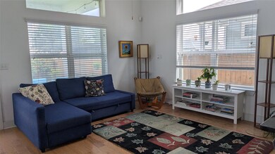 Living area with wood finished floors and plenty 