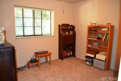 The second guest bedroom is roomy as well and also