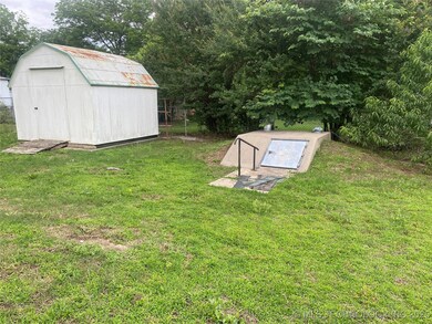 lawn mower shed and storm cellar
