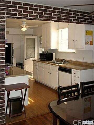 Gorgeous kitchen open to dining room and designer 
