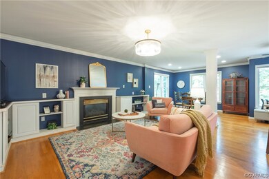 Welcoming Fam rm w/gas fireplace, built-ins, & crown molding. Hdwd floors. Open to morning rm, & kitchen.