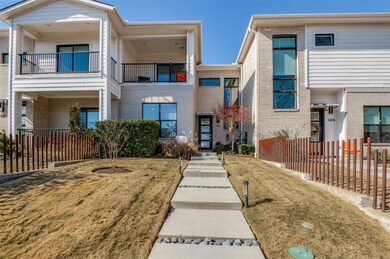 View of front of home featuring brick siding and a