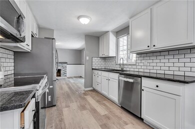 Open spacious new kitchen and all new Samsung appl