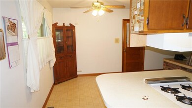 Corner cabinet in dining area will stay. 