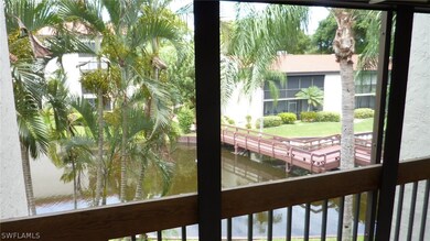 View from Lanai of walk bridge to clubhouse.