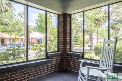 Welcoming screened-in front porch is a perfect pla