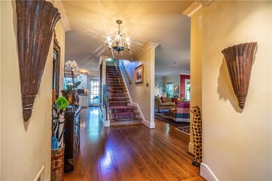 Entry with 10' ceilings and open views through to 