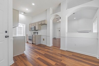 Kitchen featuring dark hardwood / wood-style floor
