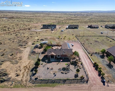 Aerial view with view of desert and a rural view