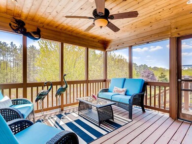 Screened porch with views of natural habitat & pon