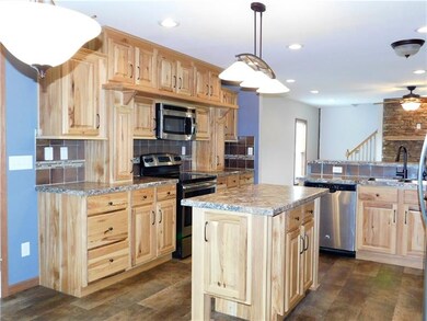 This kitchen is beautiful! The custom hickory cabi