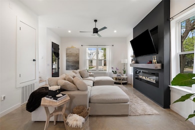 Living area with plenty of natural light, finishe