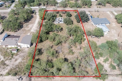 Overview of rural landscape featuring property boundaries highlighted