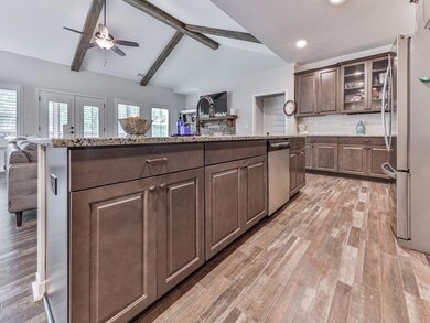 Kitchen featuring appliances with stainless steel 