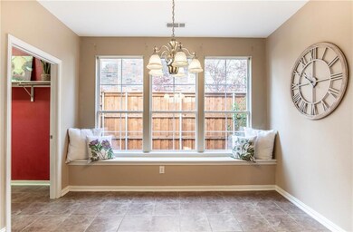 Large breakfast room with window seat and abundant