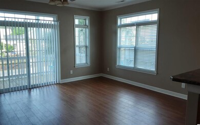 Living room dining room combo with sliders to fron