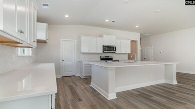 *This home will feature GRAY cabinets, white are pictured.