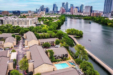 Drone / aerial view featuring a water view and a 