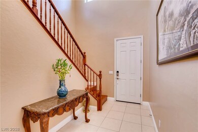Elegant high ceiling Front door entry way