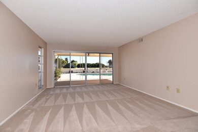 Living room views of golf course.