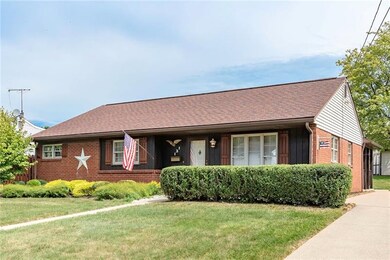 Beautiful brick ranch with nicely landscaped front