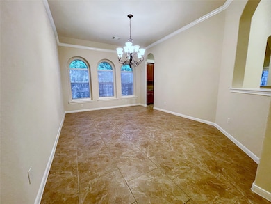 This room features a spacious dining area with ele