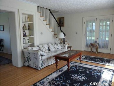 Living Room FRENCH GLASS DOORS LEAD TO BACK SCREEN
