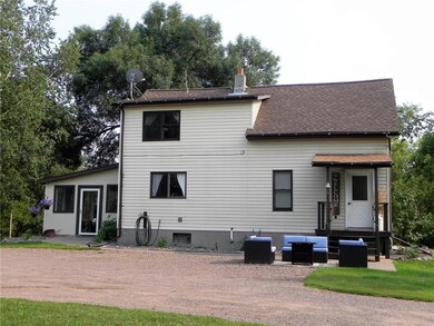 Exterior Front - Seating Area On Patio & Screened 