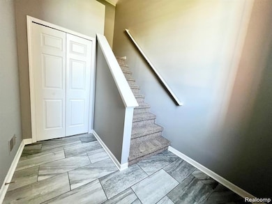 Stairway featuring baseboards
